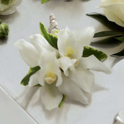 White Mini Cymbidium Boutonniere –  Lumaya Florals, Rock Hill SC